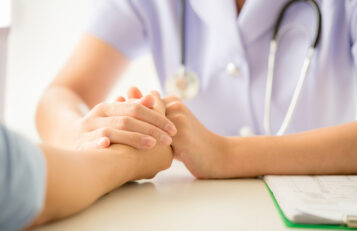 female-psychologist-consulting-patient-desk-hospital